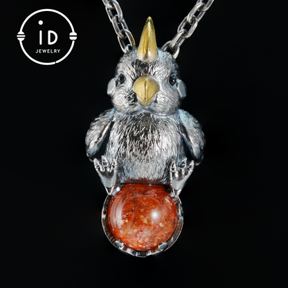 Sunstone parrot pendant made of 925 silver and bronze, hand-carved cute necklace with crystal orb, fairytale gift for her