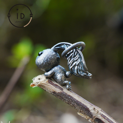 Kaninchenanhänger – springendes Häschentotem mit Onyxaugen, handgefertigtes Tieramulett, Symbol des Erwachens und Neubeginns