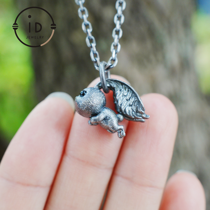 Kaninchenanhänger – springendes Häschentotem mit Onyxaugen, handgefertigtes Tieramulett, Symbol des Erwachens und Neubeginns