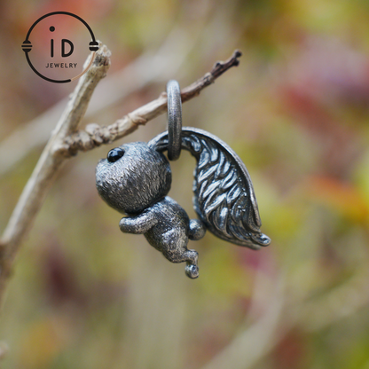 Kaninchenanhänger – springendes Häschentotem mit Onyxaugen, handgefertigtes Tieramulett, Symbol des Erwachens und Neubeginns