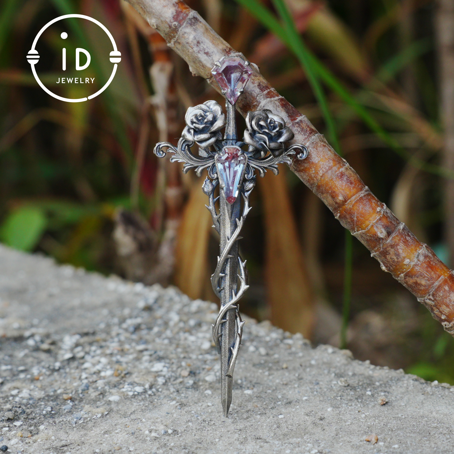Handcrafted alexandrite pendant with rose and dagger details in oxidized silver – a symbolic talisman in gothic and witchcore style
