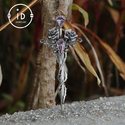 Handcrafted alexandrite pendant with rose and dagger details in oxidized silver – a symbolic talisman in gothic and witchcore style
