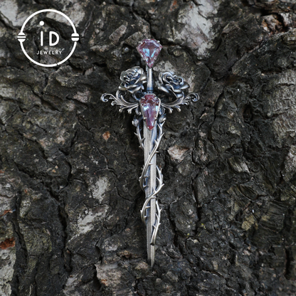 Handcrafted alexandrite pendant with rose and dagger details in oxidized silver – a symbolic talisman in gothic and witchcore style