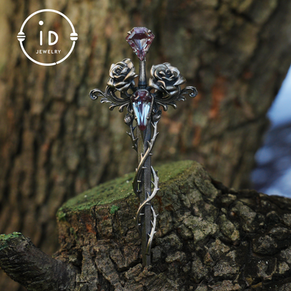 Handcrafted alexandrite pendant with rose and dagger details in oxidized silver – a symbolic talisman in gothic and witchcore style