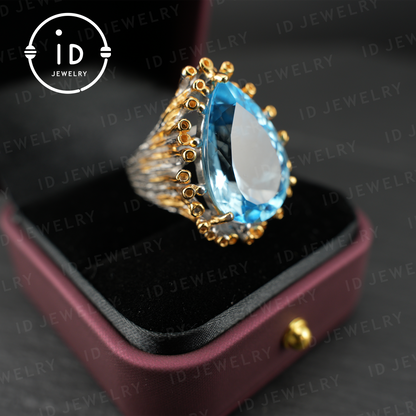 Handgefertigter blauer Topasring | einzigartiger Tropfen-Edelstein | Vintage-Silberring mit goldenen Akzenten | Boho-Schmuck | Statement-Edelsteinring 